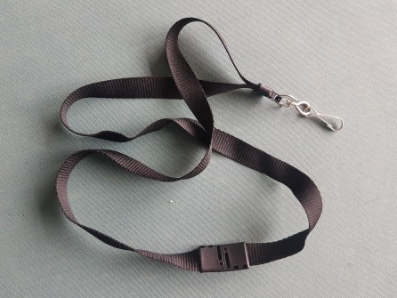 Safety cord with weaklink and shackle for ID badge
